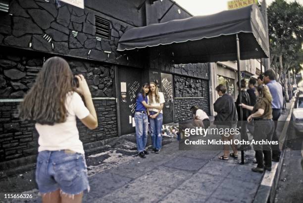 The exterior of The Viper Room the day after the death of actor River Phoenix. Fans are placing flowers, candles and notes at the spot where he...