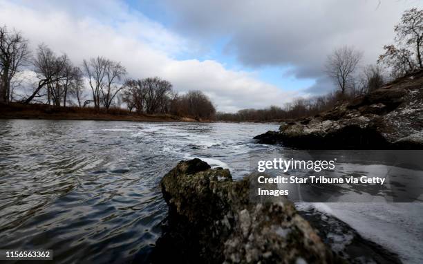 Water flows into the Minnesota River from a pipe connected to the Blue Lake treatment plant in Shakopee, MN, Monday Nov.12,2012. Phosphorus, the...