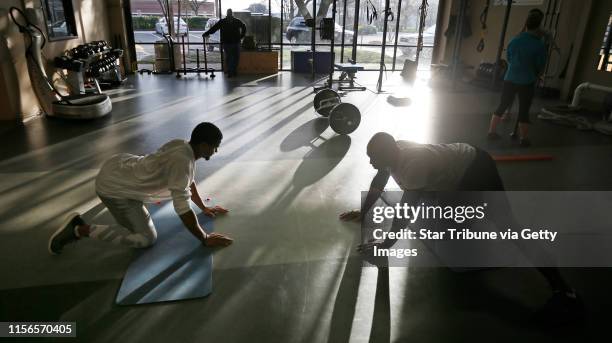 Minnesota Twins outfielder Torii Hunter right, works out 3 times a week at Synergy an athletic performance gym in Dallas Texas. Hunter works with Jon...