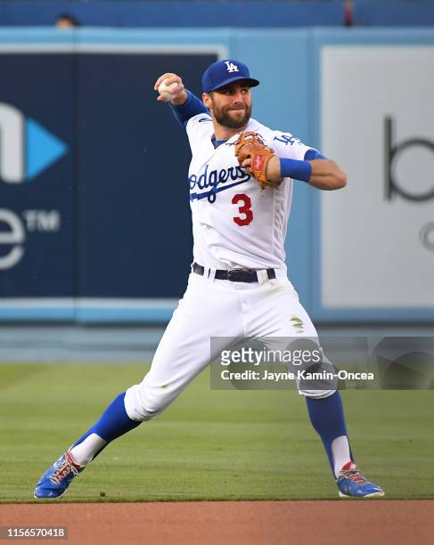 Chris Taylor of the Los Angeles Dodgers makes a play at shortstop in the game against the Chicago Cubs at Dodger Stadium on June 14, 2019 in Los...