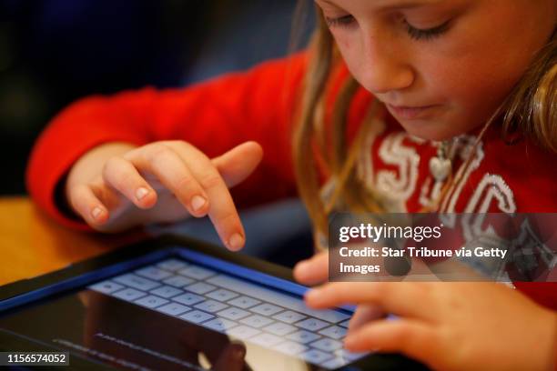 Anna Theis a third grader at Northpoint elementary school in Blaine worked on her ipad Thursday May 2, 2013 in Blaine , MN. ] JERRY HOLT ‚Ä¢...