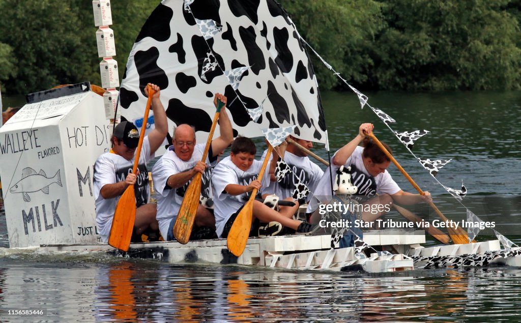 The Aquatennial's Milk Carton Boat Race at Lake Calhoun in Minneapolis. The Palzer family of Mounds View fashioned a dairy themed boat out of 370 milk cartons and went on to win the championship heat of the first round of races. (MARLIN LEVISON/STARTRIBUN