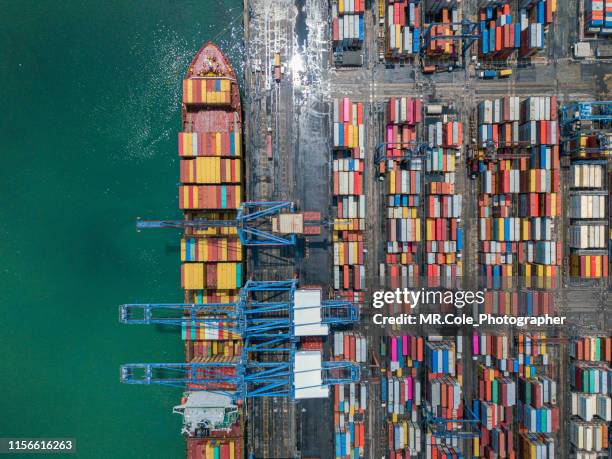 aerial view container cargo ship in terminal port,industry business logistic and transportation in thailand - shipyard stockfoto's en -beelden