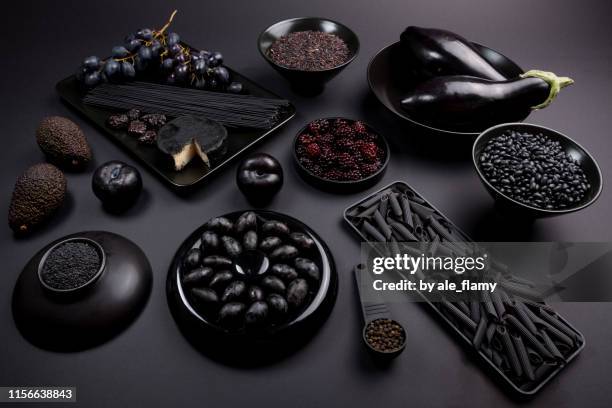black ingredients for cooking - black pepper berry stock pictures, royalty-free photos & images