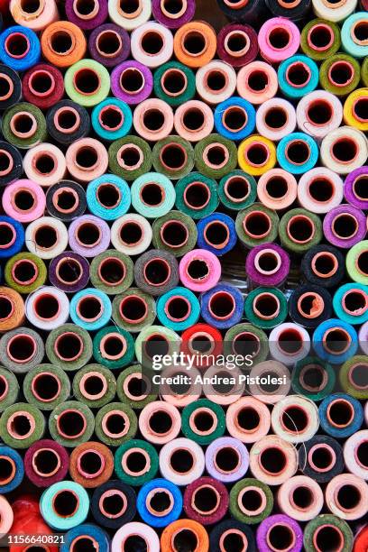 spool of sewing thread in bukhara market - uzbekistan market stock pictures, royalty-free photos & images