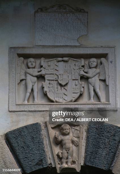 Relief with heraldic symbol supported by two Angels, first gateway to Hochosterwitz Castle, Carinthia, Austria, 9th-16th century.