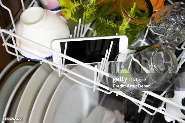 concept picture of refurbishment technology inside dishwasher. planned obsolescence. - オペレーティングシステム ストックフォトと画像