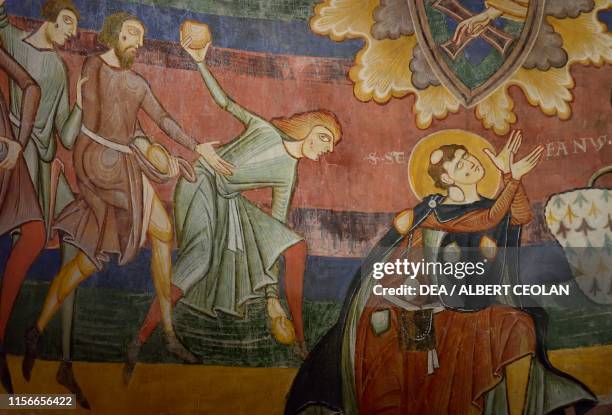 The stoning of Saint Stephen, 12th century, fresco inside the Benedictine Convent of St John , Mustair, Engadin, Canton of Graubunden, Switzerland,...