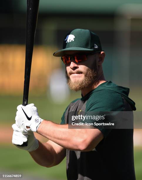 Oakland Athletics catcher Chris Herrmann during batting practice before the Major League Baseball game between the Seattle Mariners and the Oakland...