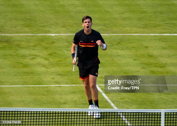 Cameron Norrie of Great Britain celebrates during his match against Kevin Anderson of South Africa during day 1 of the Fever-Tree Championships at...