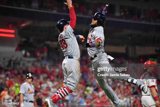 Jose Martinez of the St. Louis Cardinals celebrates with Harrison Bader of the St. Louis Cardinals after hitting a three-run home run to complete a...