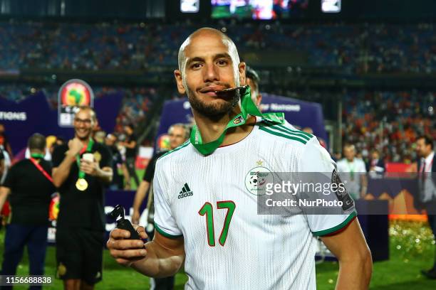 Algeria Adlene Guedioura celebrate with the Gold Medal after winning the 2019 Africa Cup of Nations Final football match between Senegal and Algeria...