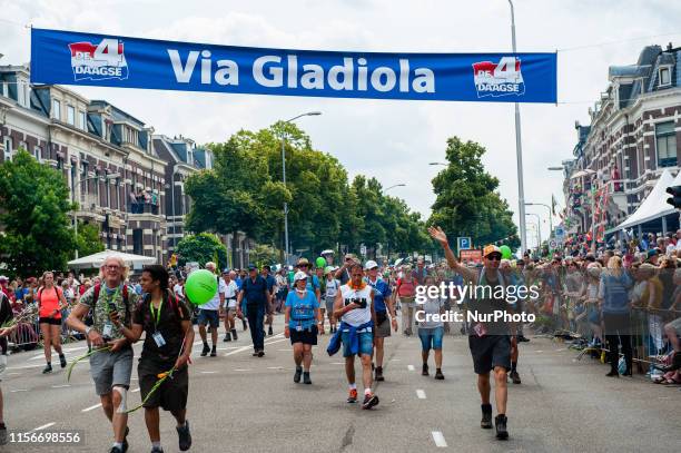 July 19th, Nijmegen, The Netherlands. After fourth and last day of The Four Day Marches the walkers finally make it to the end and recieve the warm...