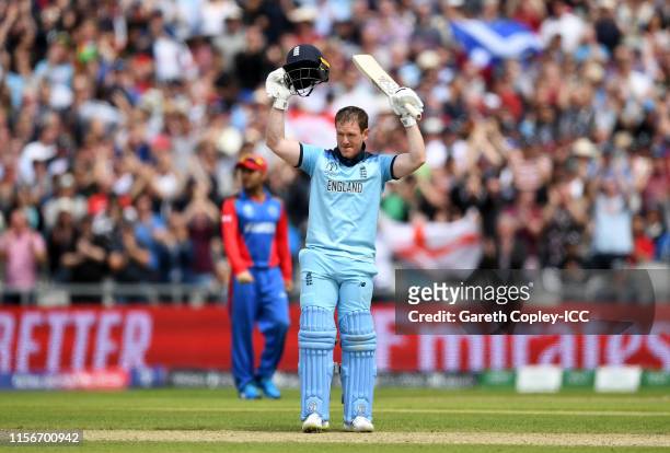 Eoin Morgan of England celebrates after reaching his century during the Group Stage match of the ICC Cricket World Cup 2019 between England and...