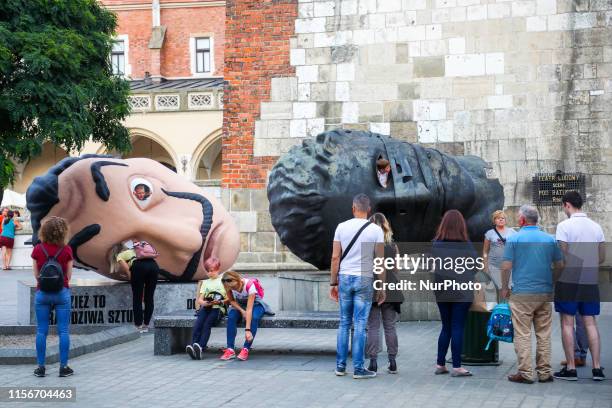 Salvador Dali's big mask is promoting the third season of Netflix Spanish television series 'Money Heist' at the Main Square in Krakow, Poland on...