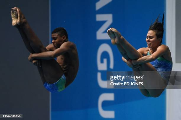Brazil's Luis Felipe and Brazil's Tammy Takagi compete in the mixed synchronised 3m springboard diving final during the 2019 World Championships at...
