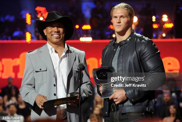 Hines Ward and Clay Matthews speak on stage at the 2011 CMT Music Awards at the Bridgestone Arena on June 8, 2011 in Nashville, Tennessee.