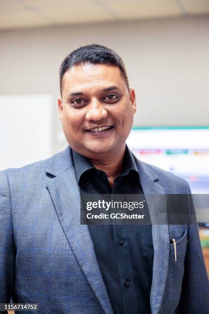 portrait of an indian corporate male executive - profile picture stock pictures, royalty-free photos & images