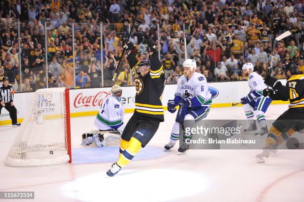 Rich Peverley of the Boston Bruins scores a goal against the Vancouver Canucks in Game Four of the 2011 NHL Stanley Cup Final at TD Garden on June 8,...