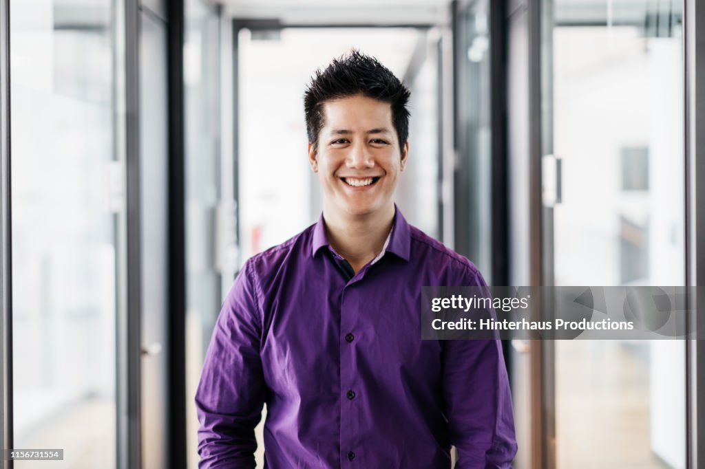 Portrait Of Office Employee Smiling