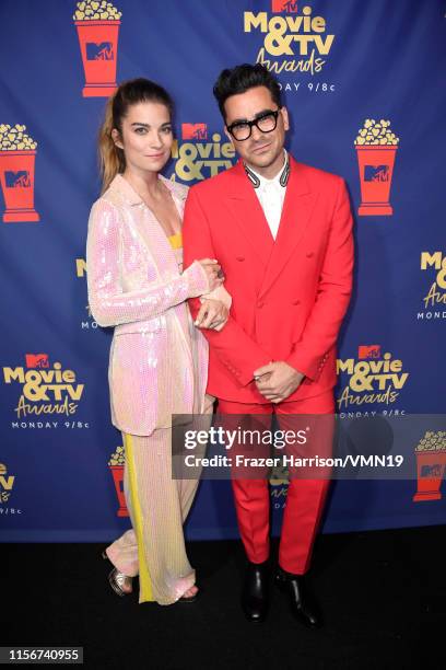 Annie Murphy and Daniel Levy attend the 2019 MTV Movie and TV Awards at Barker Hangar on June 15, 2019 in Santa Monica, California.