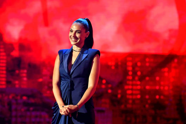 Gal Gadot speaks onstage during the 2019 MTV Movie and TV Awards at Barker Hangar on June 15, 2019 in Santa Monica, California.