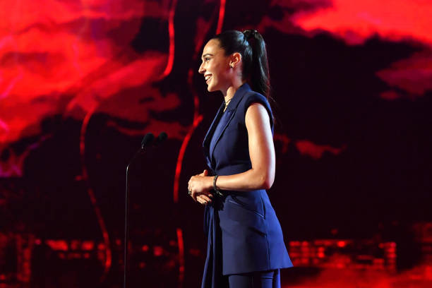 Gal Gadot speaks onstage during the 2019 MTV Movie and TV Awards at Barker Hangar on June 15, 2019 in Santa Monica, California.