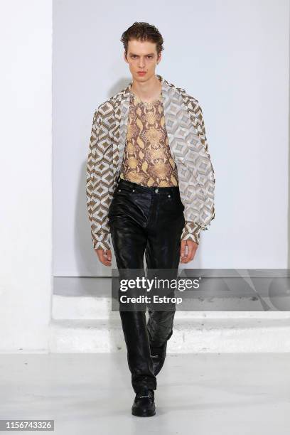 Model walks the runway at the CMMN SWDN fashion show during Paris Men's Fashion Week Spring/Summer 2020 on June 18, 2019 in Paris, France.