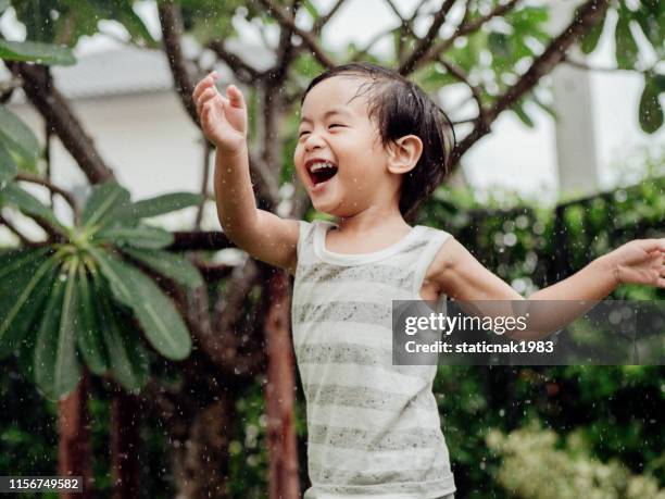 baby boy enjoying first summer days in nature - asian toddler stock pictures, royalty-free photos & images