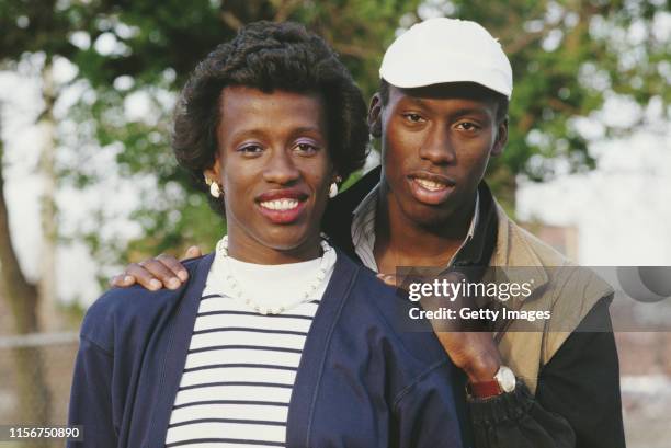 Olympic and World Heptathlon and Long Jump Champion Jackie Joyner-Kersee of the United States posing for a portrait with her 1984 Olympic Triple Jump...