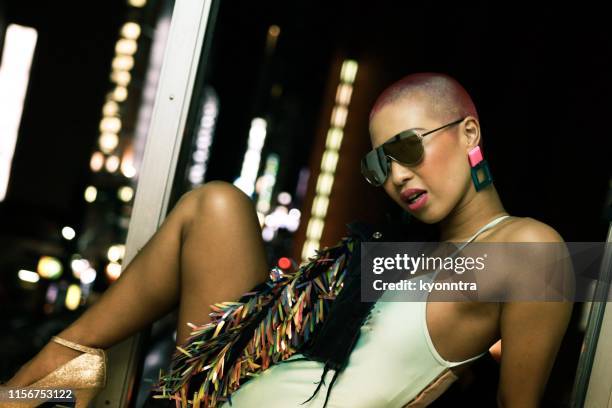 buzz cut woman - tongue stud stock pictures, royalty-free photos & images