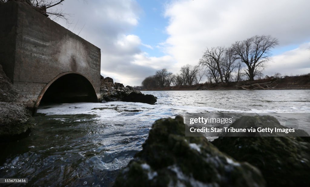 Water flows into the Minnesota River from a pipe connected to the Blue Lake treatment plant in Shakopee, MN, Monday Nov.12,2012. Phosphorus, the pollutant that sometimes made the lower Minnesota River an algae-filled dead zone, has been reduced so far tha