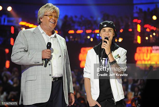 Ron White and Justin Bieber on stage at the 2011 CMT Music Awards at the Bridgestone Arena on June 8, 2011 in Nashville, Tennessee.