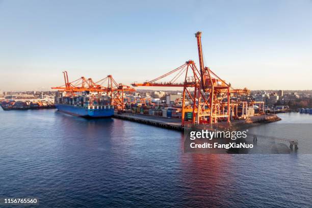 gantry cranes at container terminals vancouver, bc - vancouver canada stock pictures, royalty-free photos & images