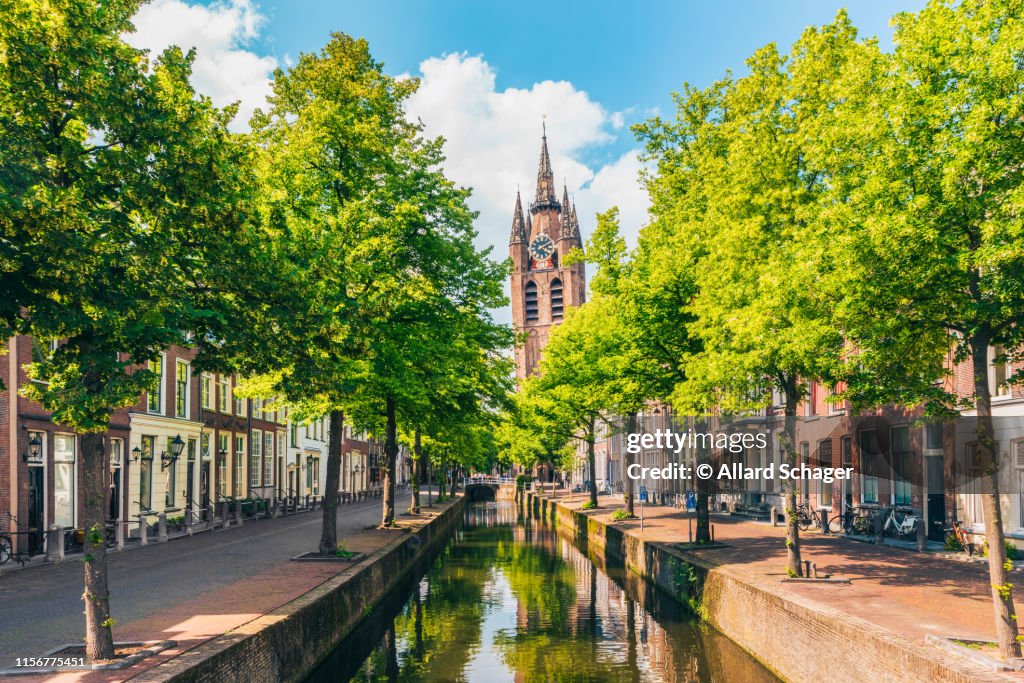 Canal with Leaning Church Tower in Delft Netherlands