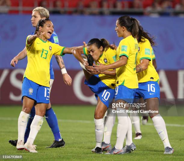 Marta of Brazil celebrates with teammates after scoring her team's first goal during the 2019 FIFA Women's World Cup France group C match between...