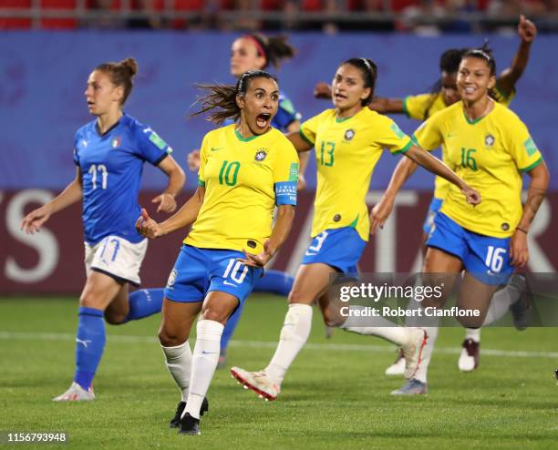 Marta of Brazil celebrates with teammates after scoring her team's first goal during the 2019 FIFA Women's World Cup France group C match between...