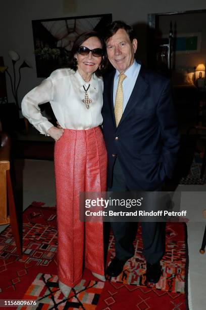 Judy Price and her husband Peter Price, who organize the event at their home, attend Yanou Collart signs her Book "Les Etoiles de ma Vie - Stars of...