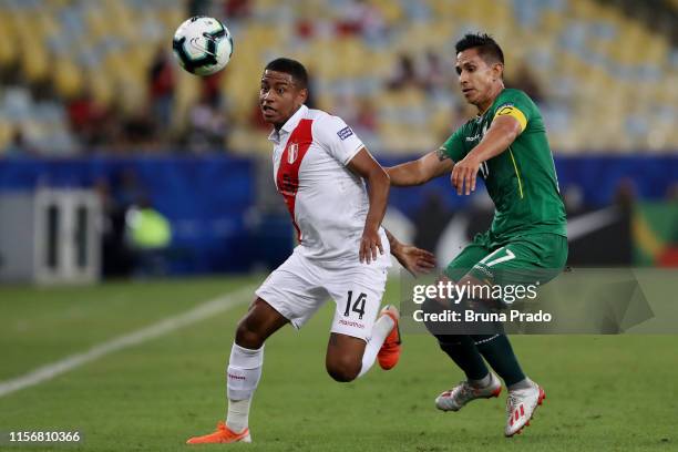 Andy Polo of Peru fights for the ball with Marvin Bejarano of Bolivia during the Copa America Brazil 2019 group A match between Bolivia and Peru at...