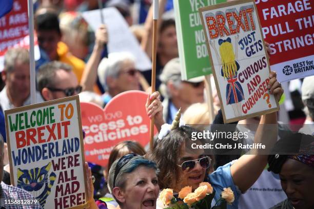 Protesters holding placards march to Parliament Square in Westminster during the "No To Boris, Yes To Europe" March on July 20, 2019 in London,...