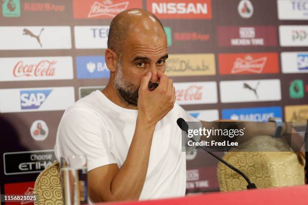 Pep Guardiola , manager of Manchester City speaks at a press conference during the 2019 Premier League Asia Trophy Final at Shanghai Hongkou Stadium...