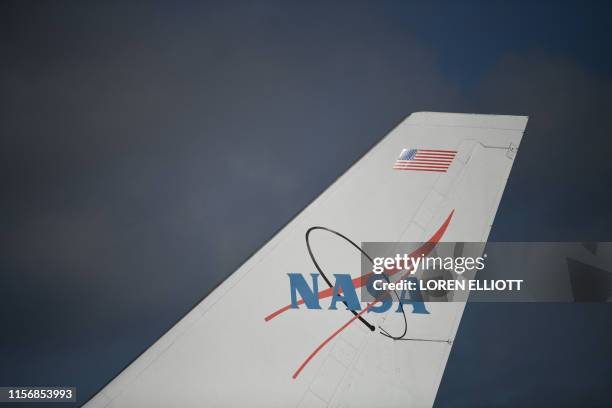 The NASA logo is seen on a Space Shuttle carrier aircraft during the Apollo 11, 50th anniversary celebration at Space Center Houston on July 20 in...