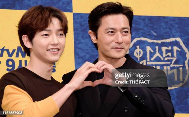 Actor Song Joong-ki and actor Jang Dong-gun attend tvN drama "Arthdal Chronicles" premiere at Imperial Palace Hotel on May 28, 2019 in Seoul, South...