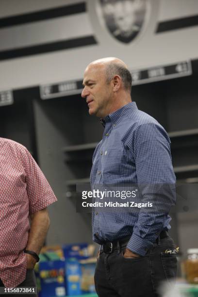 Managing Partner John Fisher of the Oakland Athletics stands in the Athletics draft room, during the opening day of the 2019 MLB draft, at the...