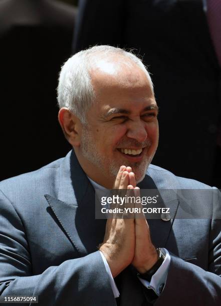 Iranian Foreign Minister Mohammad Javad Zarif gestures dthe family photo of the Ministerial Meeting of the Coordinating Bureau of the Non-Aligned...
