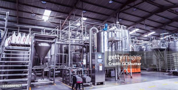 fully automated dairy factory in africa - food processing plant stock pictures, royalty-free photos & images