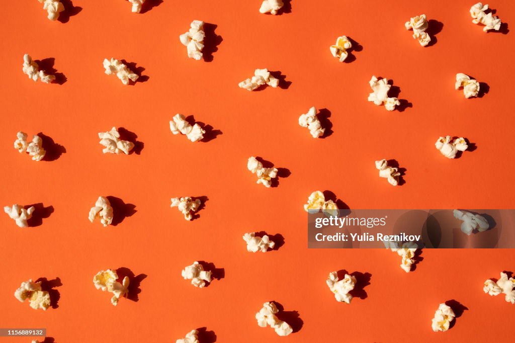 Directly above shot of Popcorns on the orange background