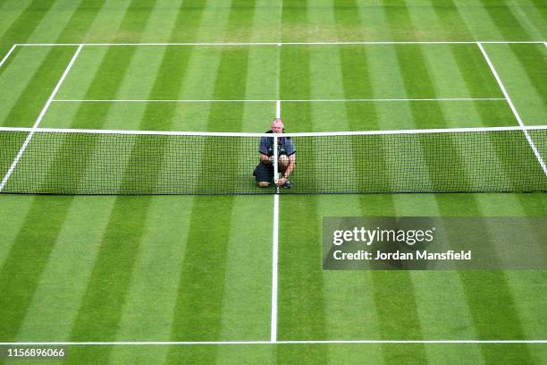 Groundstaff prepare the courts ahead of the start of play on day three of the Nature Valley Classic at Edgbaston Priory Club on June 19, 2019 in...