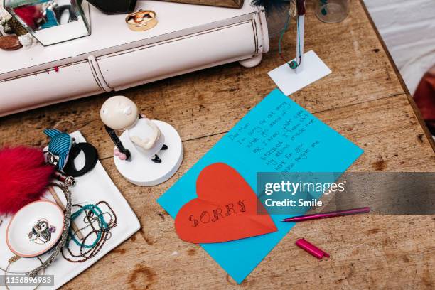 i'm sorry notes left on a dressing table - sympathy card stock pictures, royalty-free photos & images