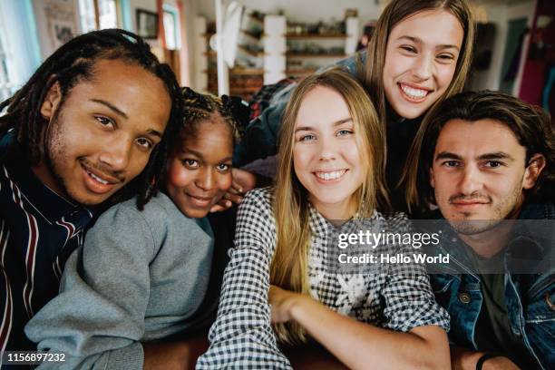 happy beautiful young mixed group taking a selfie - young adult photos stock-fotos und bilder